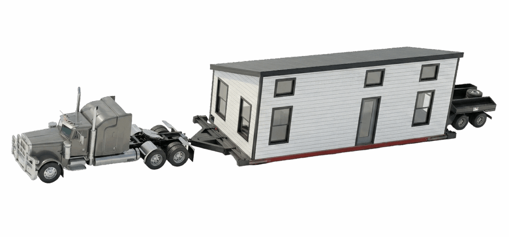 A semi-truck is towing a modern tiny house on wheels, with a black roof and white siding. The house has multiple windows and a door, and an additional small trailer is attached at the rear.